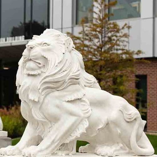 A white lion statue on the PNW Hammond Campus