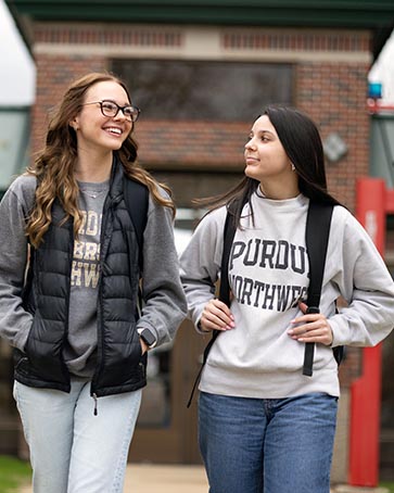 PNW students walk across campus