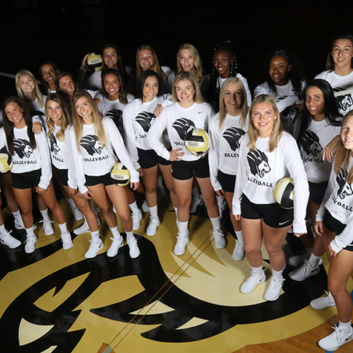 PNW's Women's Volleyball Team Poses on the Court