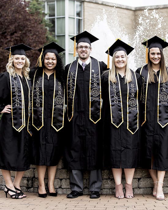 PNW graduates pose at commencement