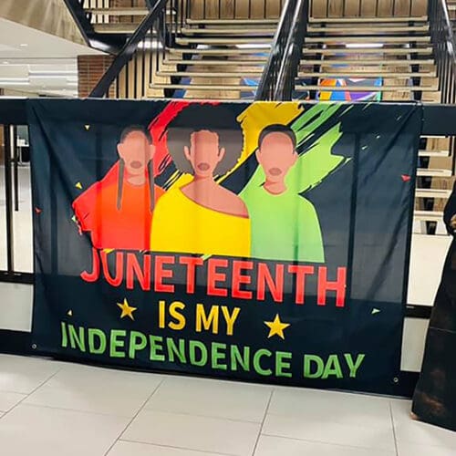 Flag featuring three people with the words "Juneteenth is my independence day"