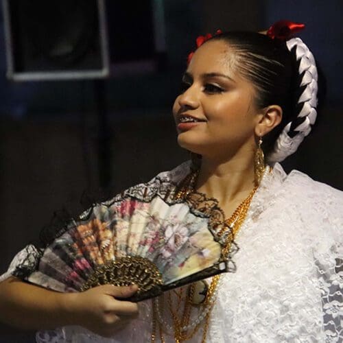 Young girl dancing during the Hispanic Heritage Festival