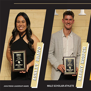 Leo Award winners Ashley Bravo and Harry Hooper holding their plaques.