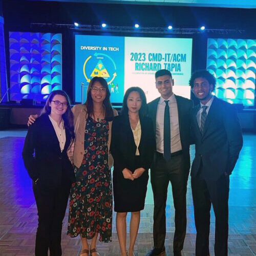 Five people stand together. From left ot right: Alyssa Gargano, Jay Chen, Grace Yang, Julian Silva, and Quin Owens.