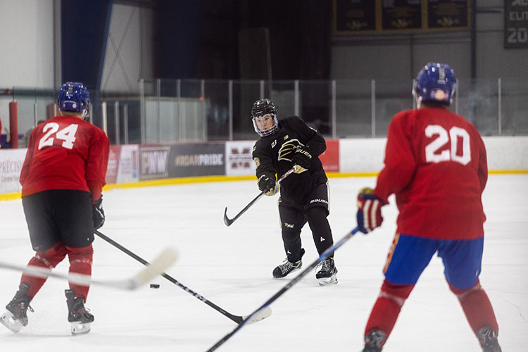 This jam-packed day of sports included women’s and men’s soccer, baseball, softball, ice hockey games and flag football. PNW hockey players during a game