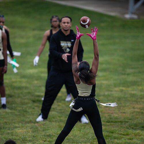 PNW's flag football team member makes a catch
