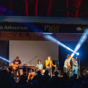 Performers on stage at an Acorn Concert Series show.