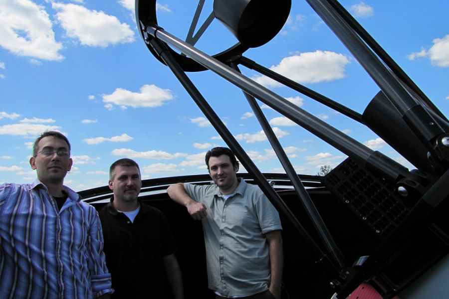 Adama and staff next to telescope