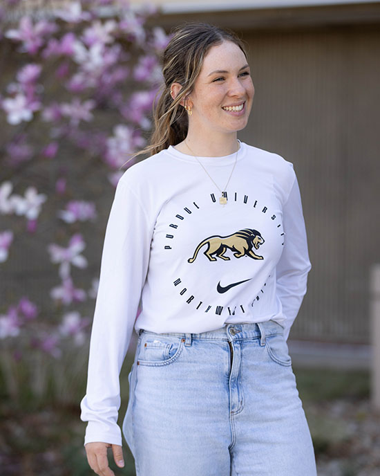 A PNW biology student poses outdoors.
