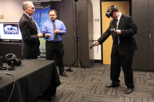 Congressman Visclosky checks out demos performed by the CIVS staff members John Moreland and Kyle Toth
