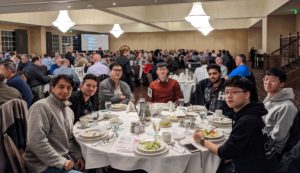 Students at the PNW table at the dinner
