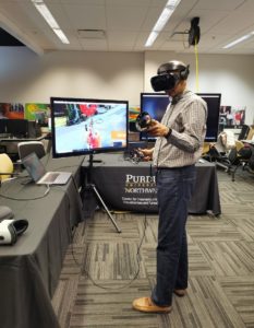NIPSCO employees try out some VR applications in the CIVS VIS Lab