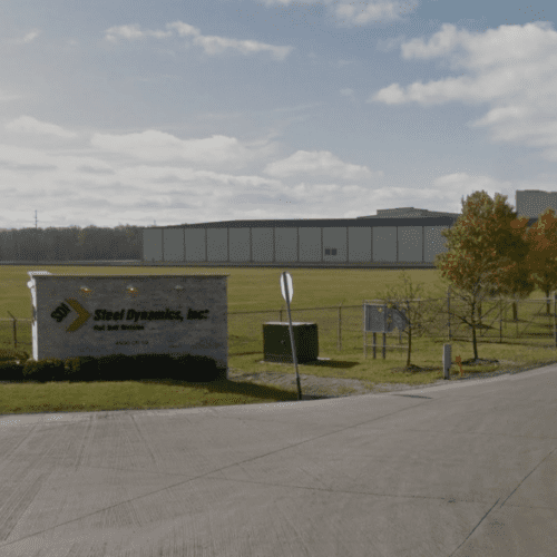 SDI sign and factory in the background