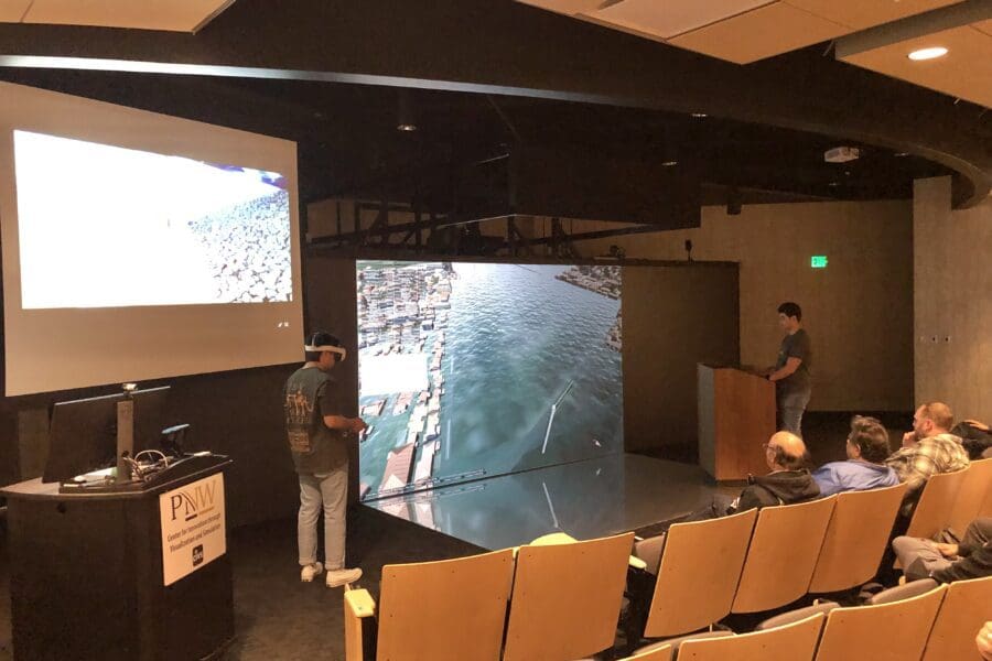 People sit in the CIVS theater