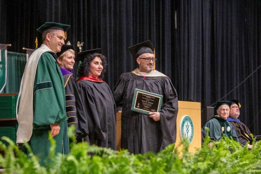man receiving award