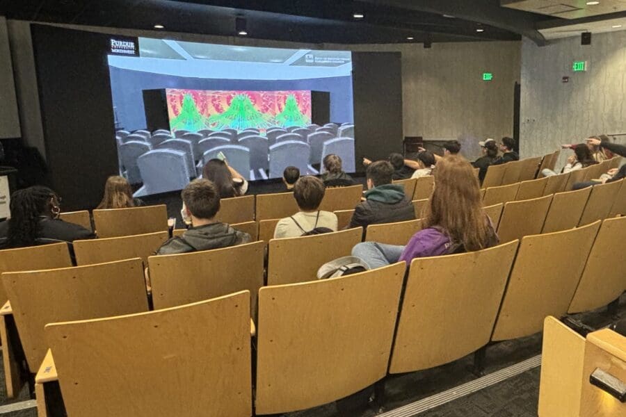 students watching theater screen