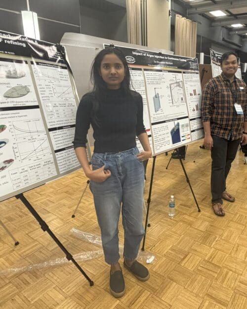 students standing with posters