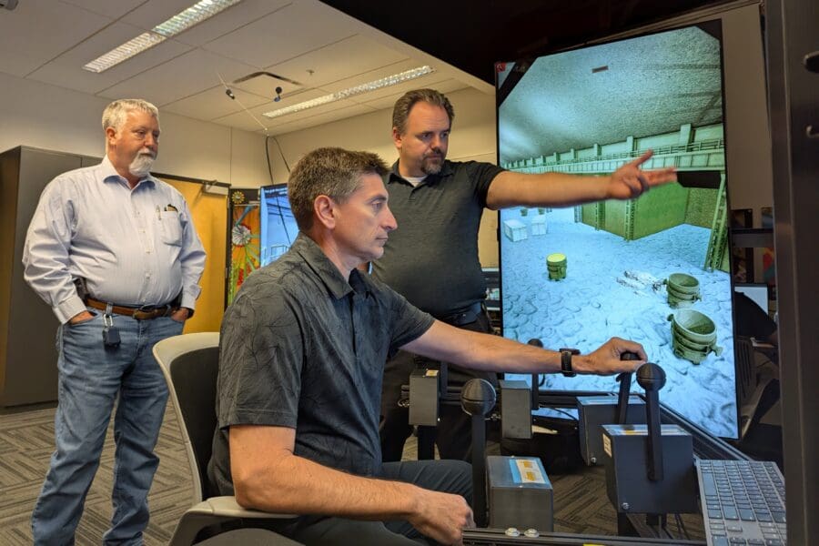 man operating crane simulator