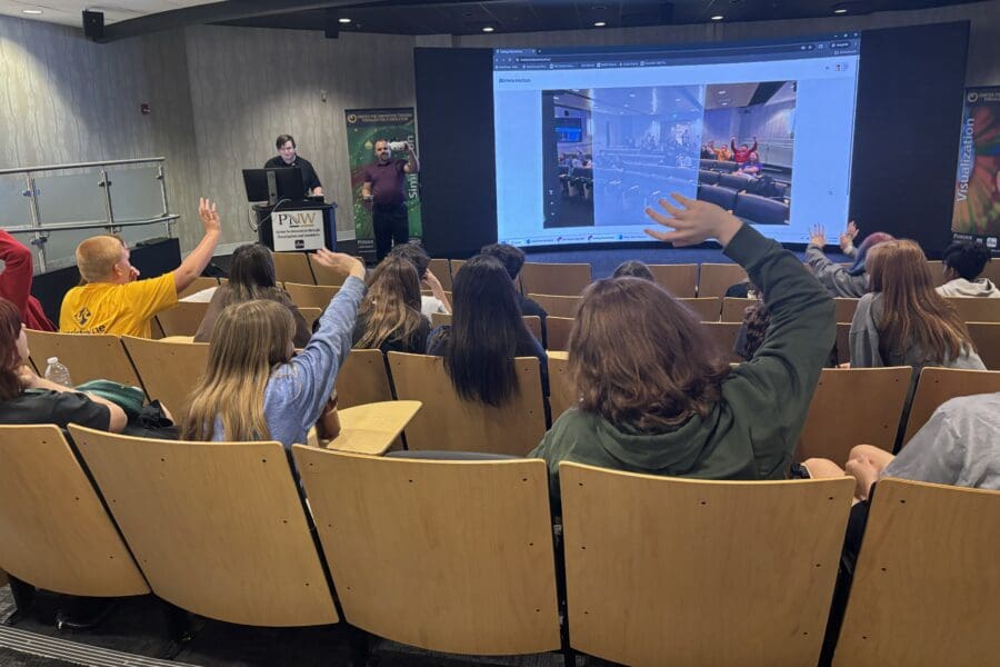 students watching theater screen