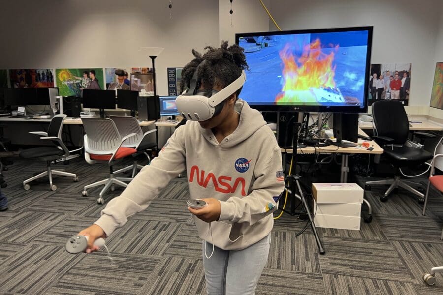 student using VR headset