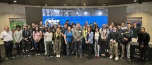 Group of people in front of Theater screen