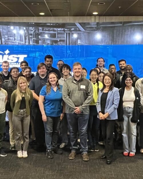 Group of people in front of Theater screen