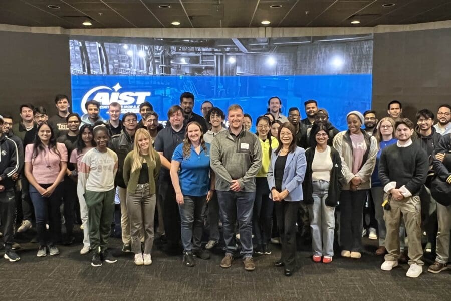 Group of people in front of Theater screen