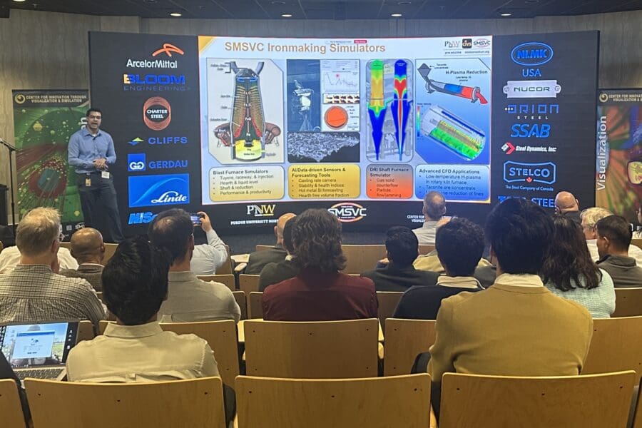 Ty Okosun presenting to audience