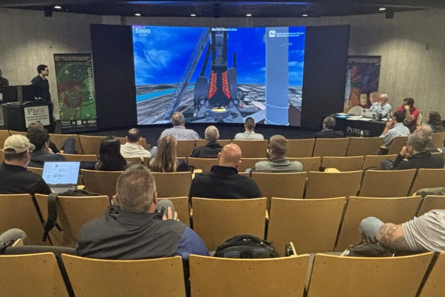 Ty Okosun presenting to audience