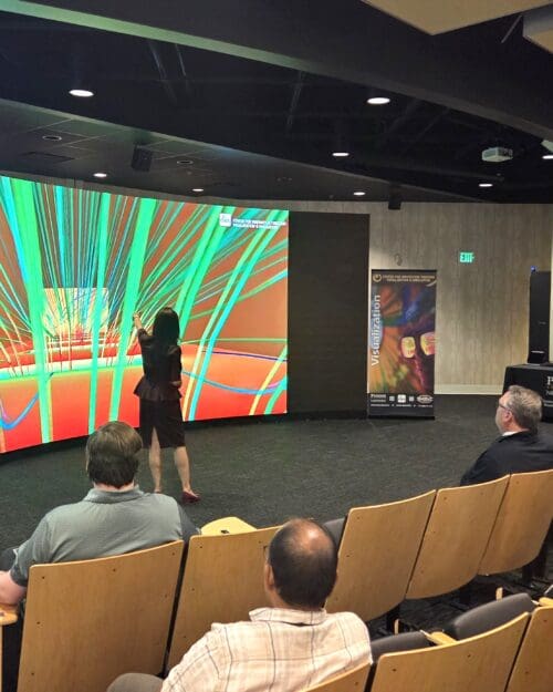 Chenn Zhou presenting to audience