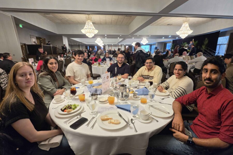 tables of PNW students at AIST dinner
