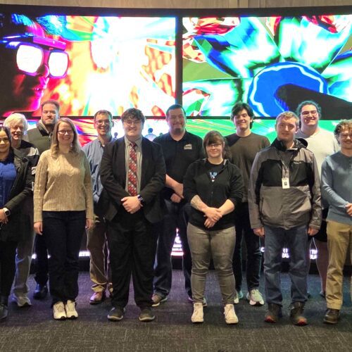group of people in front of theater screen