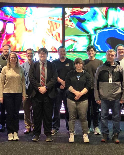 group of people in front of theater screen