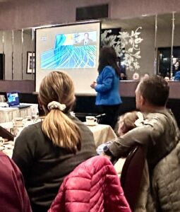 Chenn Zhou presenting to audience