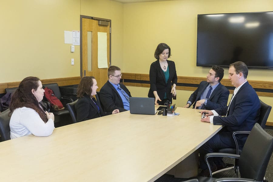 Students sitting around desk