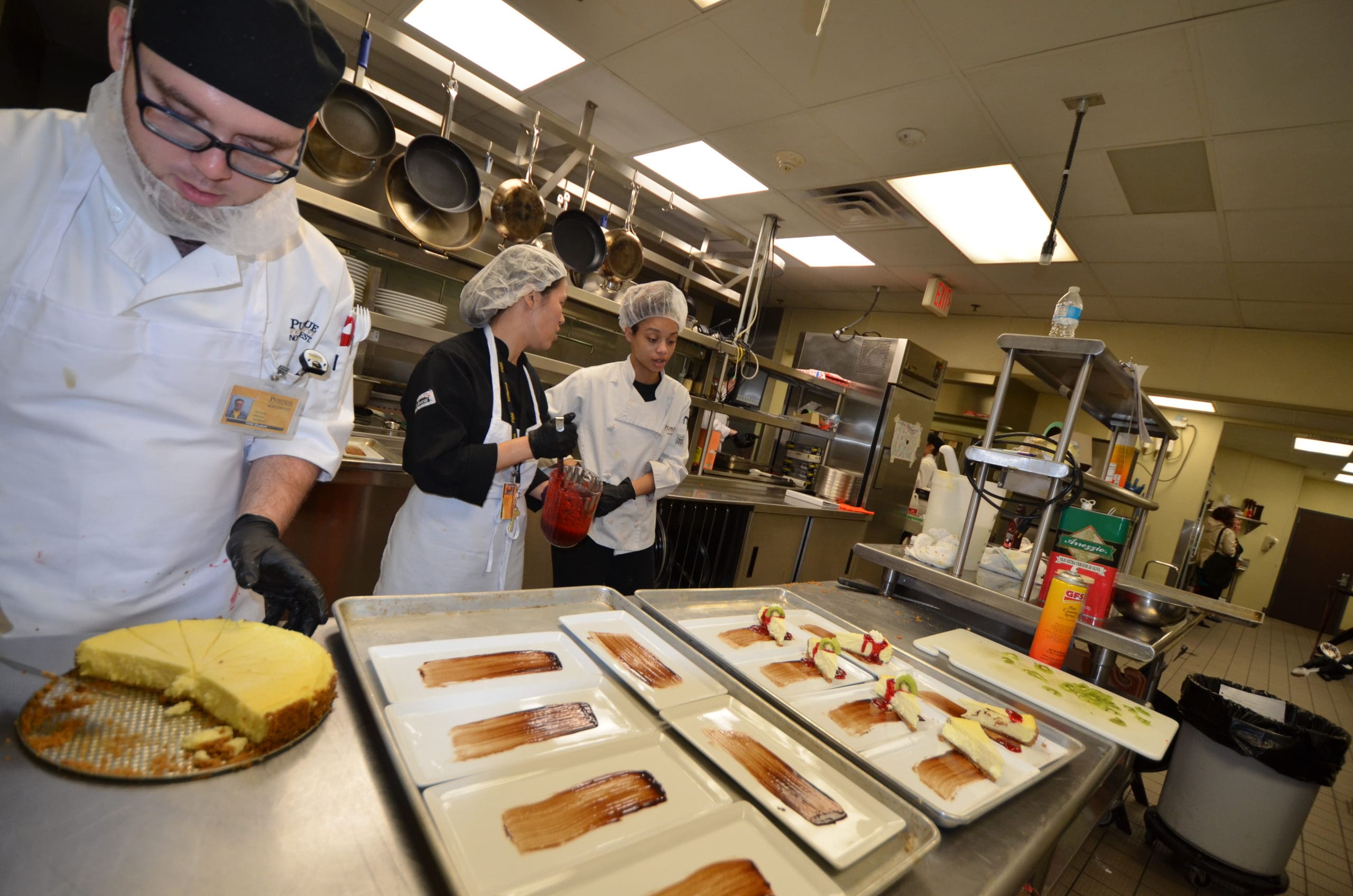 HTM students working in kitchen