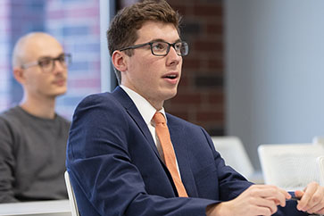 Male student speaking in class