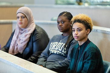 Three women in the classroom