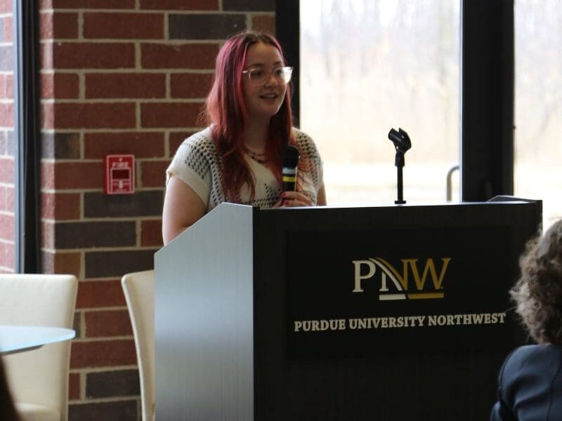 Student speaking at podium