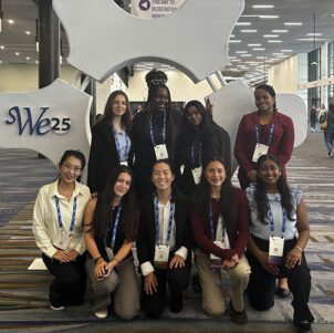 A group of students at a Society of Women Engineers event.