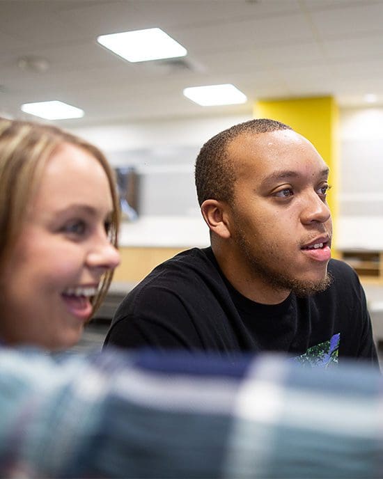 Students laugh together