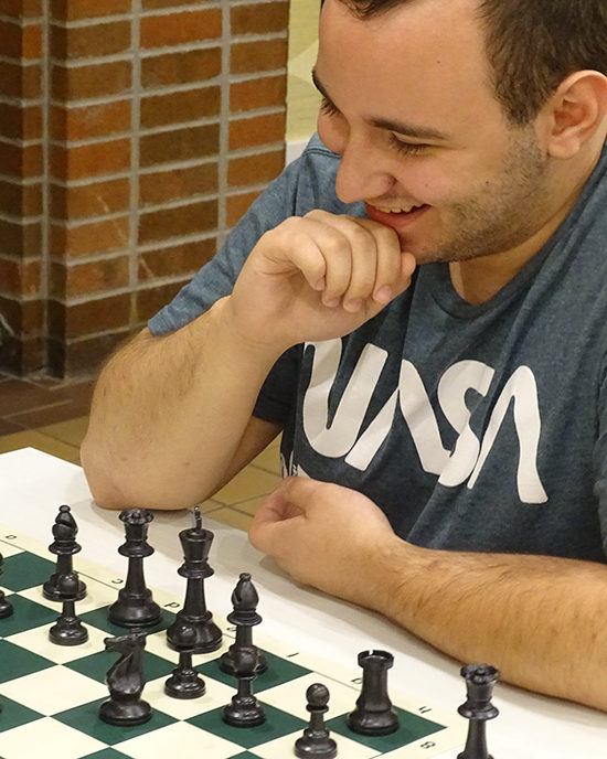 Student playing chess