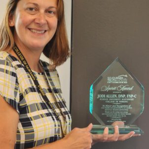 Jodi Allen, FNP program coordinator and assistant professor in the College of Nursing at Purdue University Northwest, was awarded the Spirit Award by Sojourner Truth House (STH) during its 25th Anniversary Celebration.