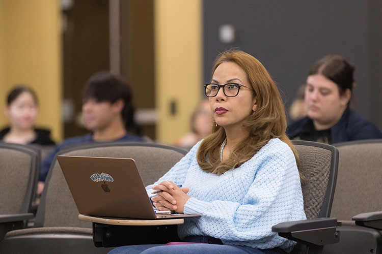 A student sits in a classroom