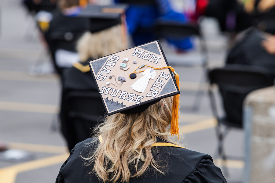 A decorated cap is pictured at commencement.