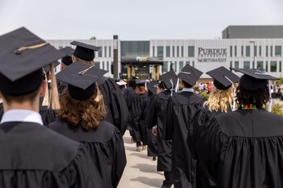 Graduates marching in
