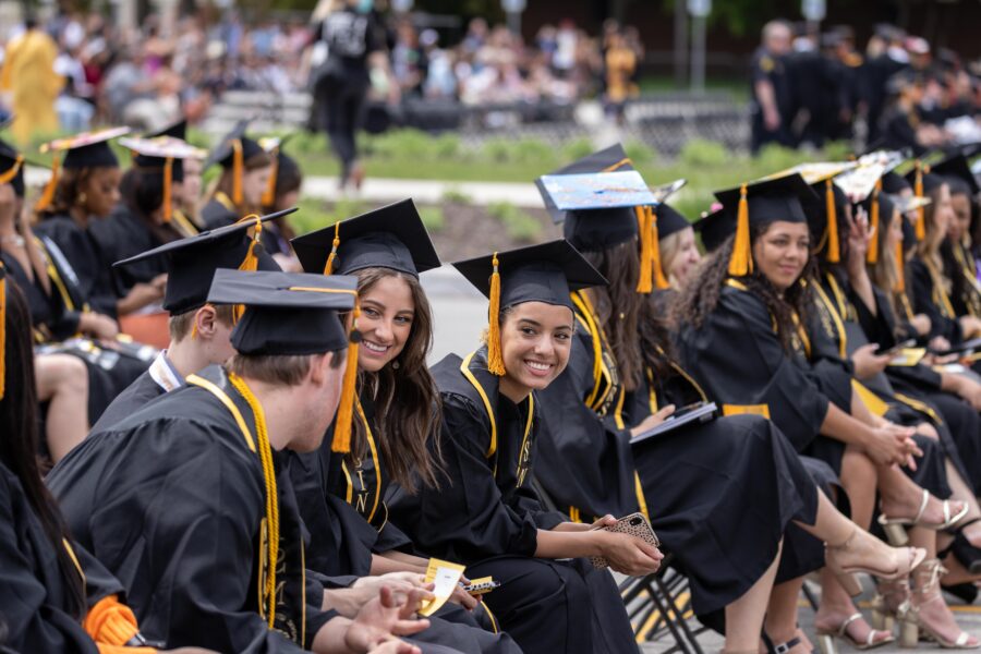 Students sitting during commencement