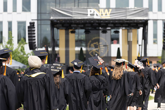 PNW graduate march into commencement