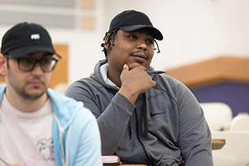 Communication students listen in the classroom