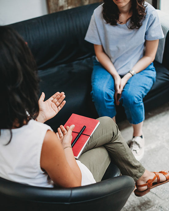 Two people during a therapy session.